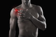 African American athlete with glowing shoulder