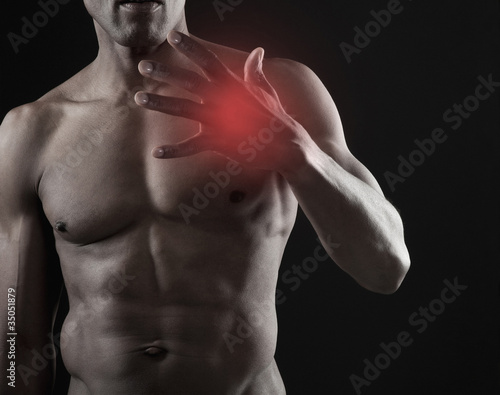 Photo: African American athlete with glowing hand African American athlete with glowing hand