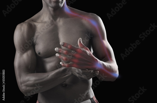 Photo: African American athlete with glowing arm African American athlete with glowing arm