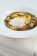 "Italian entree of egg, polenta and truffles"