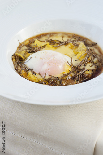 Photo: "Italian entree of egg, polenta and truffles" "Italian entree of egg, polenta and truffles"