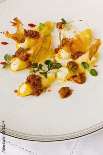 Photo: Italian cheese cannelloni with sauce Italian cheese cannelloni with sauce