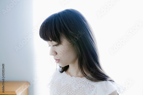 Photo: Serious mixed race woman Serious mixed race woman