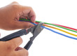 men cut the electrical cable