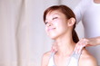 young japanese woman getting a massage