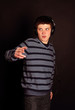 A young boy listening to music