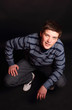 A young boy sitting