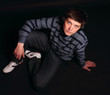 A young boy sitting