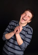 A young boy laughing