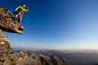 Photo: Looking forward. Young man overlooking mountain range Looking forward. Young man overlooking mountain range