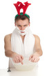 shaving handsome young man in elks horns