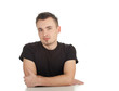 sitting thoughtful young man in black blouse