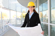 Woman Architect  with blueprints