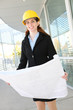 Woman Architect  with blueprints