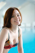 Young girl at the swimming pool