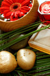 spa composition of soap, stones and flowers