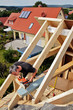 carpenters constructing a dormer