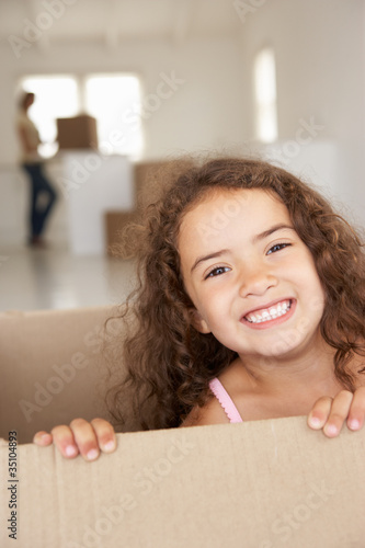 Photo: Little girl in new home Little girl in new home
