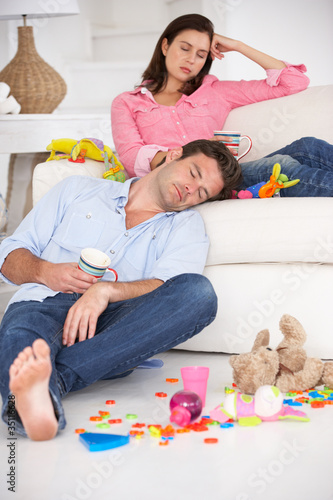 Photo: Exhausted parents resting Exhausted parents resting