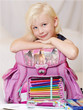 Foto: Cute blond child is happy to start at school Cute blond child is happy to start at school