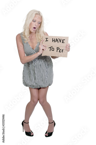 Foto: Woman Holding a Sign Woman Holding a Sign