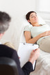 Psychologist talking to a female patient Psychologist talking to a female patient