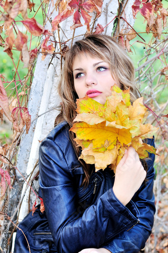 Photo: girl with autumn leaves girl with autumn leaves