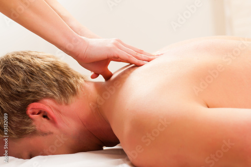 Photo: Patient at the physiotherapy - massage Patient at the physiotherapy - massage