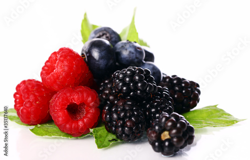 Photo: Fresh forest berries over white background Fresh forest berries over white background