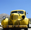 An yellow abandoned Bonnie and Clyde vehicle An yellow abandoned Bonnie and Clyde vehicle
