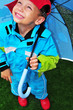 Kind mit Regenschirm