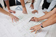 Foto: Team of architects on construciton site Team of architects on construciton site