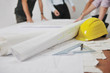 Foto: Team of architects on construciton site Team of architects on construciton site