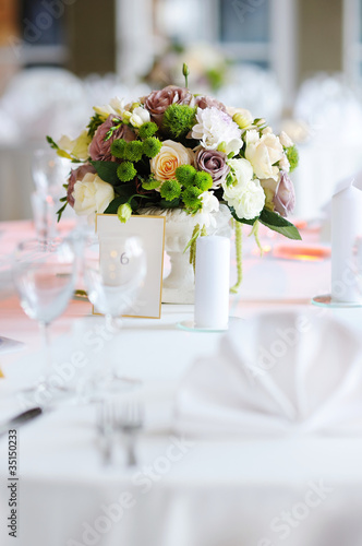 Photo: Table set for an event party or wedding reception Table set for an event party or wedding reception