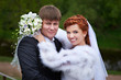 Bride embrase groom