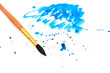 brush with blue paint stroke and stick