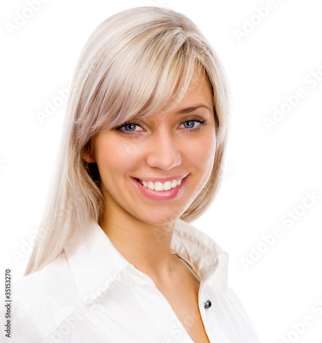 Photo: Young smiling businesswoman. Isolated on white background Young smiling businesswoman. Isolated on white background