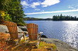 Adirondack chairs at lake shore