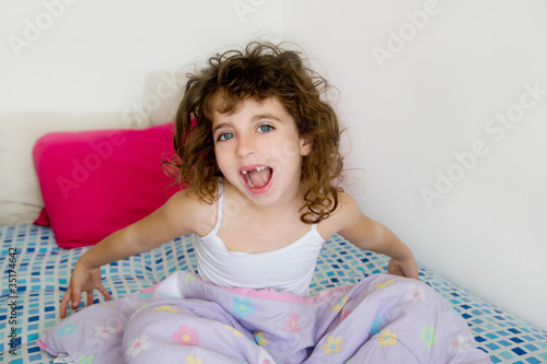 Photo: awakening girl yawning bed messy morning hair awakening girl yawning bed messy morning hair