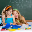 happy laughing kids student girls at school classroom