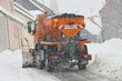 canvas print picture - Winter service vehicle in use in heavy snow-fall