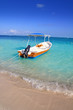 boats in caribbean beach turquoise sea