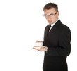 businessman in business attire standing drinking coffee