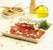 Carpaccio de ternera con rúcula y parmesano