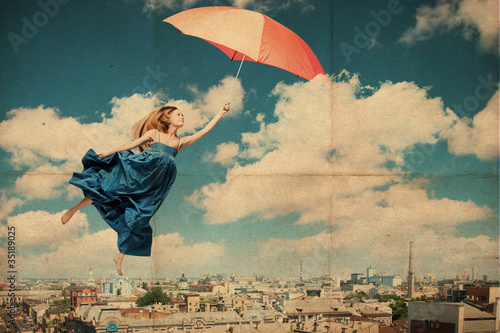 Photo: art collage with beautiful young woman with umbrella art collage with beautiful young woman with umbrella