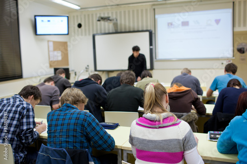 Photo: college student sitting in a classroom college student sitting in a classroom