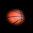 Basketball ball with dark edges on black background