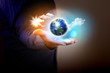 Human hand holding earth