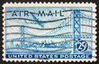 Postage stamp USA 1947 Plane over San Francisco â€“ Oakland Bay Br