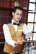 Cheerful arab barman